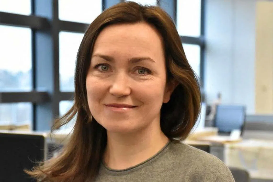 FILE PHOTO: Alsu Kurmasheva, an editor with Radio Free Europe/Radio Liberty's (RFE/RL) Tatar-Bashkir Service, poses in this undated handout photo. Pangea Graphics (RFE/RL)/Handout via REUTERS/File Photo