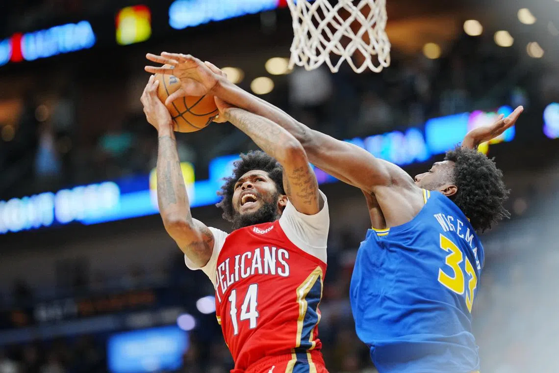New Orleans Pelicans forward Brandon Ingram shoots the ball against Golden State Warriors centre James Wiseman during the third quarter at Smoothie King Centre.