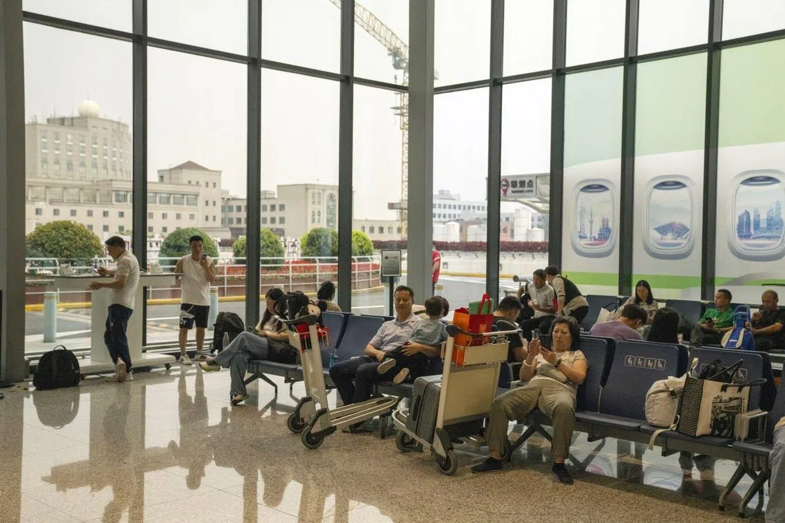 Travelers at Hongqiao International Airport in Shanghai, China, on Wednesday, Sept. 27, 2023. More Chinese travelers are delaying outbound plans amid economic uncertainty, according to a new survey, potentially rough news for countries depending on one of the world's biggest source of tourists. Source: Bloomberg