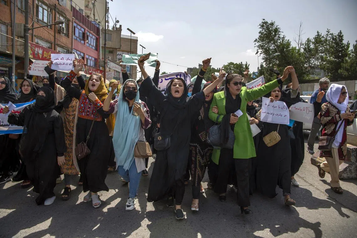 Women protest the loss of freedoms imposed by Taliban rule in Kabul on Sept 18, 2022. In a rare show of unity, the United Nations Security Council has adopted a resolution condemning the Taliban's discrimination against women and girls in Afghanistan. 