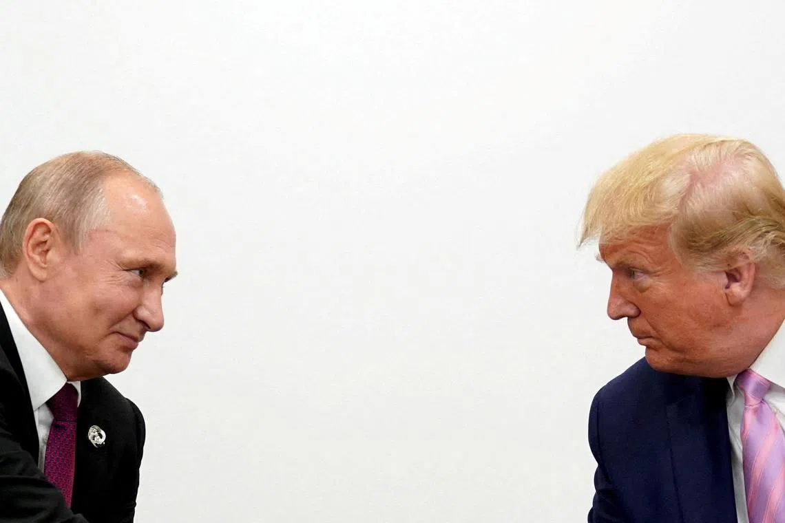 Mr Putin (left) offered congratulations to Mr Donald Trump on his inauguration as president.