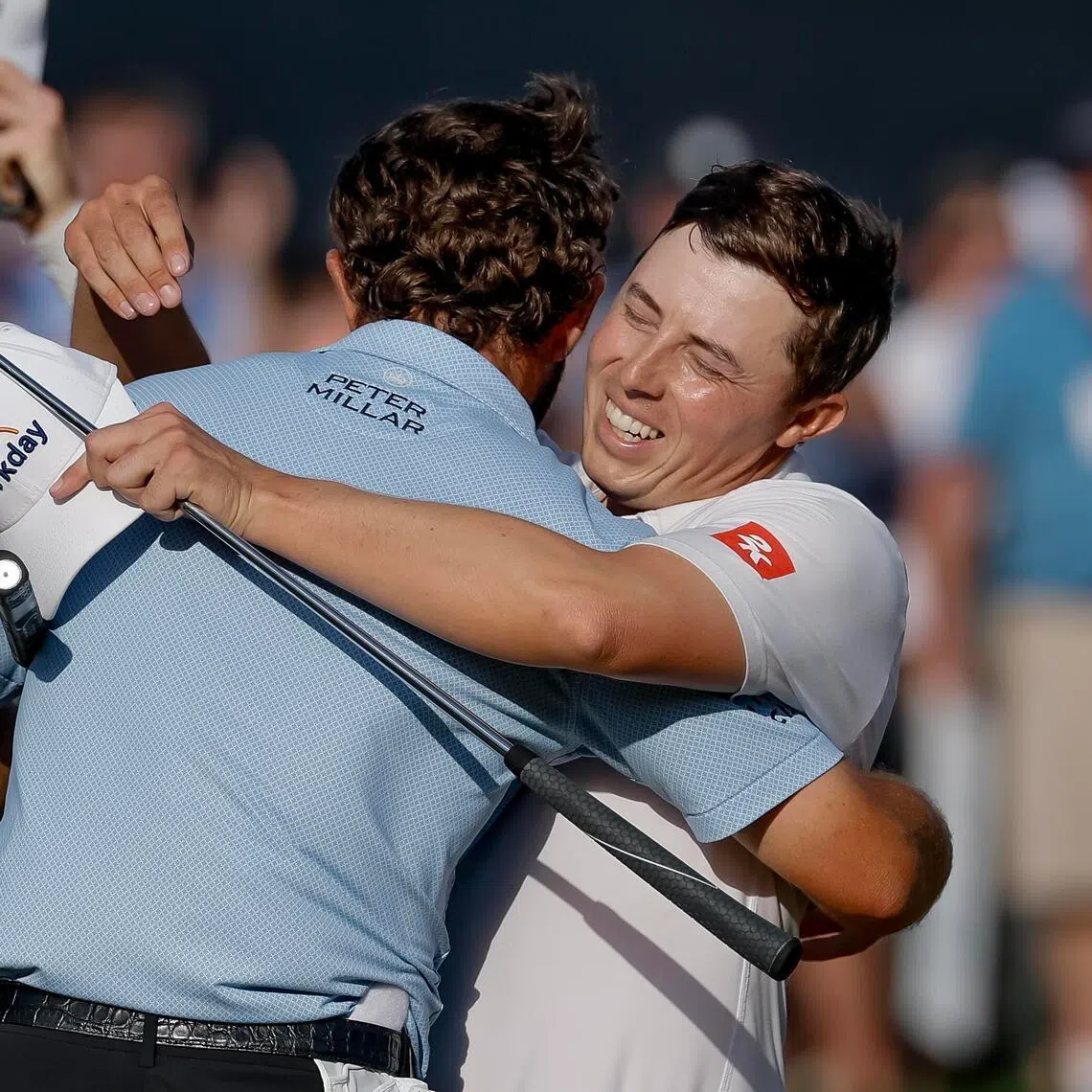 Who's the champion? Matt Fitzpatrick, right, might have finished second at the Players Championship, but his response to winner Cameron Young is a classy grin. 