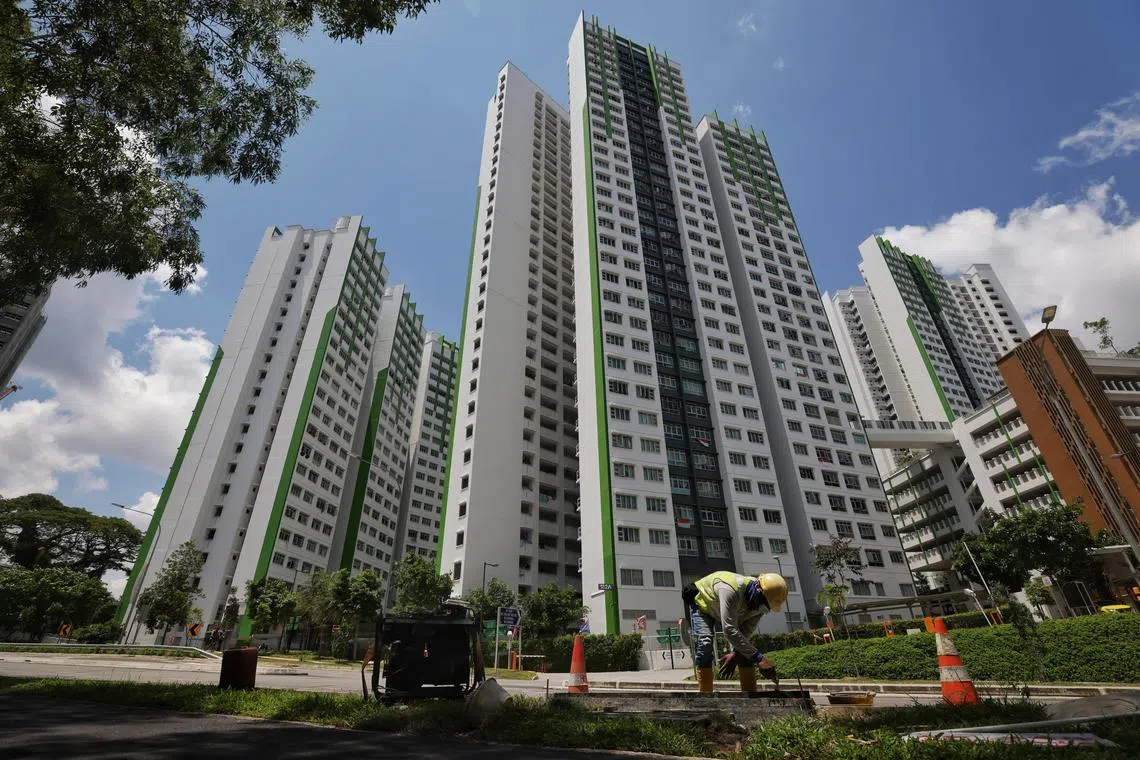 Blocks 185A (left) and 182A (centre) of Marsiling Greenview on Aug 28, 2021. Integrated block 182A has rental and owned units, and Block 185A is entirely rental flats.
