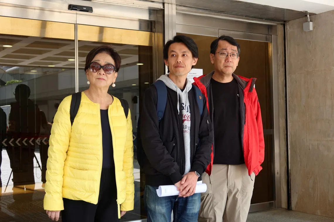 Former lawmaker and Democratic Party former chairwoman Emily Lau, Democratic Party chairman Lo Kin-hei and Democratic Party member Winfield Chong meet reporters after an appellate court upheld Lo's acquittal, outside the Hong Kong's High Court, in Hong Kong, China March 21, 2025. REUTERS/Jessie Pang