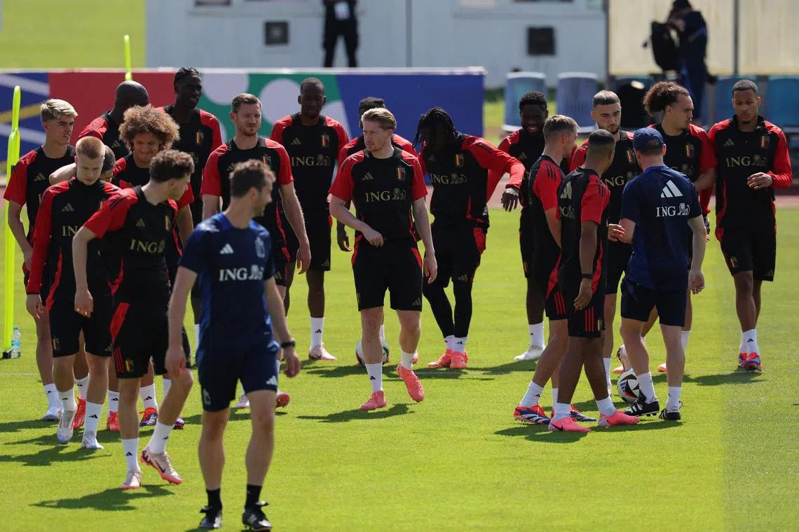 Belgium players during a training session, as Kevin de Bruyne (centre) remains the key player when the Red Devils take on Ukraine.
