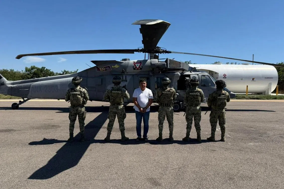 Members of Mexican Special Forces escort Audias Flores, known as “El Jardinero” a top commander of the powerful Jalisco New Generation Cartel, in the western state of Nayarit, Mexico, in this handout distributed on April 27, 2026.