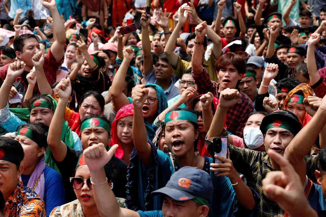 Bangladeshi indigenous people protest following a clash between indigenous people, Bengalis and the military, at the University of Dhaka, on Sept 20.