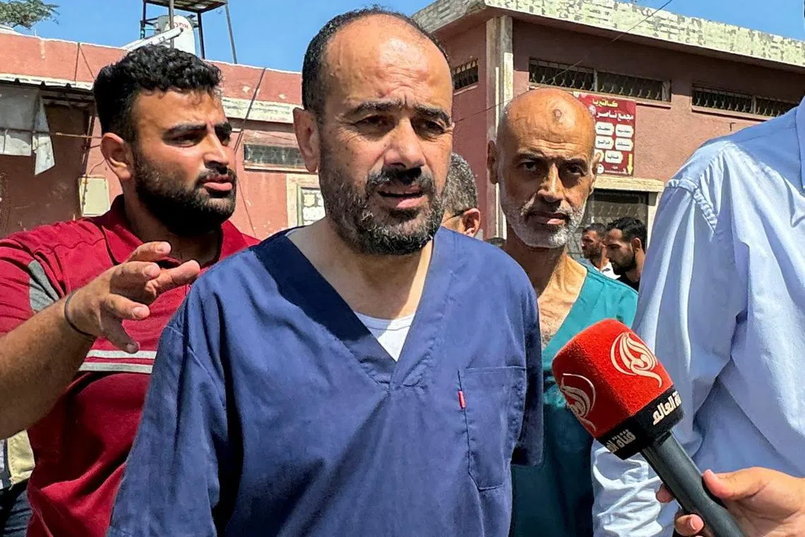 Palestinian doctor Mohammad Abu Salmiya walks after his release from an Israeli jail.