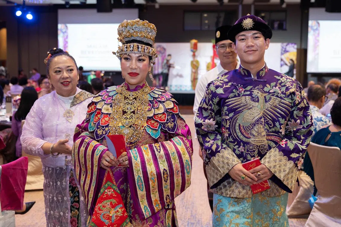 Ms Penelope Thoo and Mr Kean Wee celebrated their wedding at a dinner and dance marking the 113th anniversary of the Gunong Sayang Association.