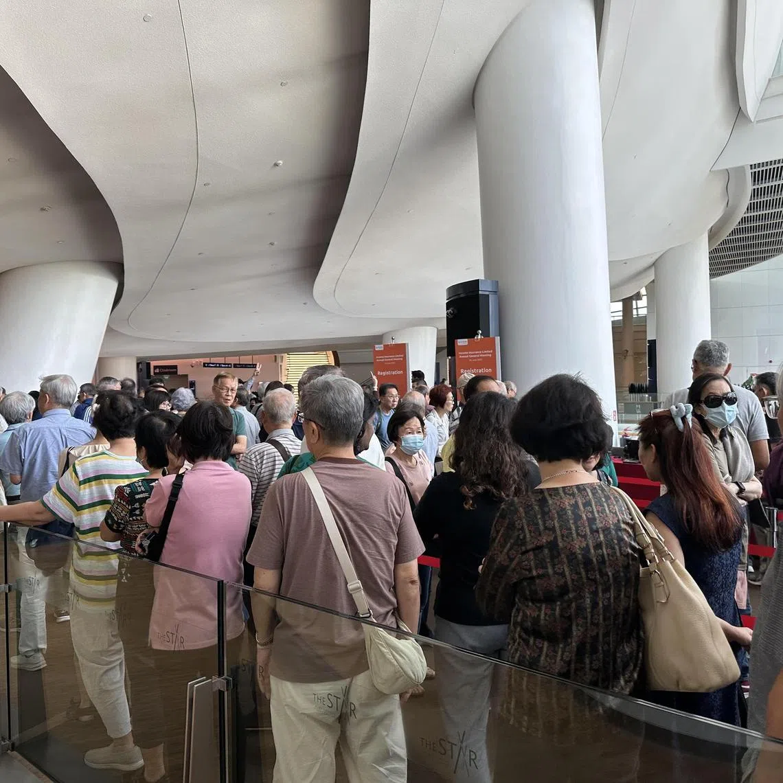 atagm24 - The crowd arriving to attend Income Insurance's annual general meeting on June 24, 2025, at The Star Vista, Buona Vista. 

Credit: Angela Tan
Permission: For ST use only 
upload these photos to biz folder