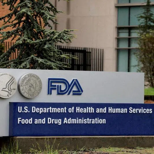 Signage is seen outside of the Food and Drug Administration (FDA) headquarters in White Oak, Maryland, U.S., August 29, 2020. REUTERS/Andrew Kelly/File Photo