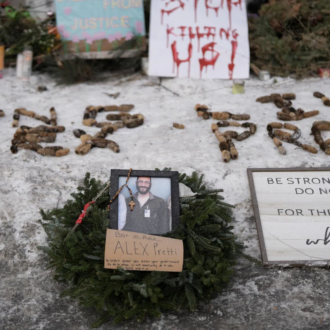 A makeshift memorial at the site where a man identified as Alex Pretti was fatally shot by federal immigration agents trying to detain him, in Minneapolis, Minnesota.