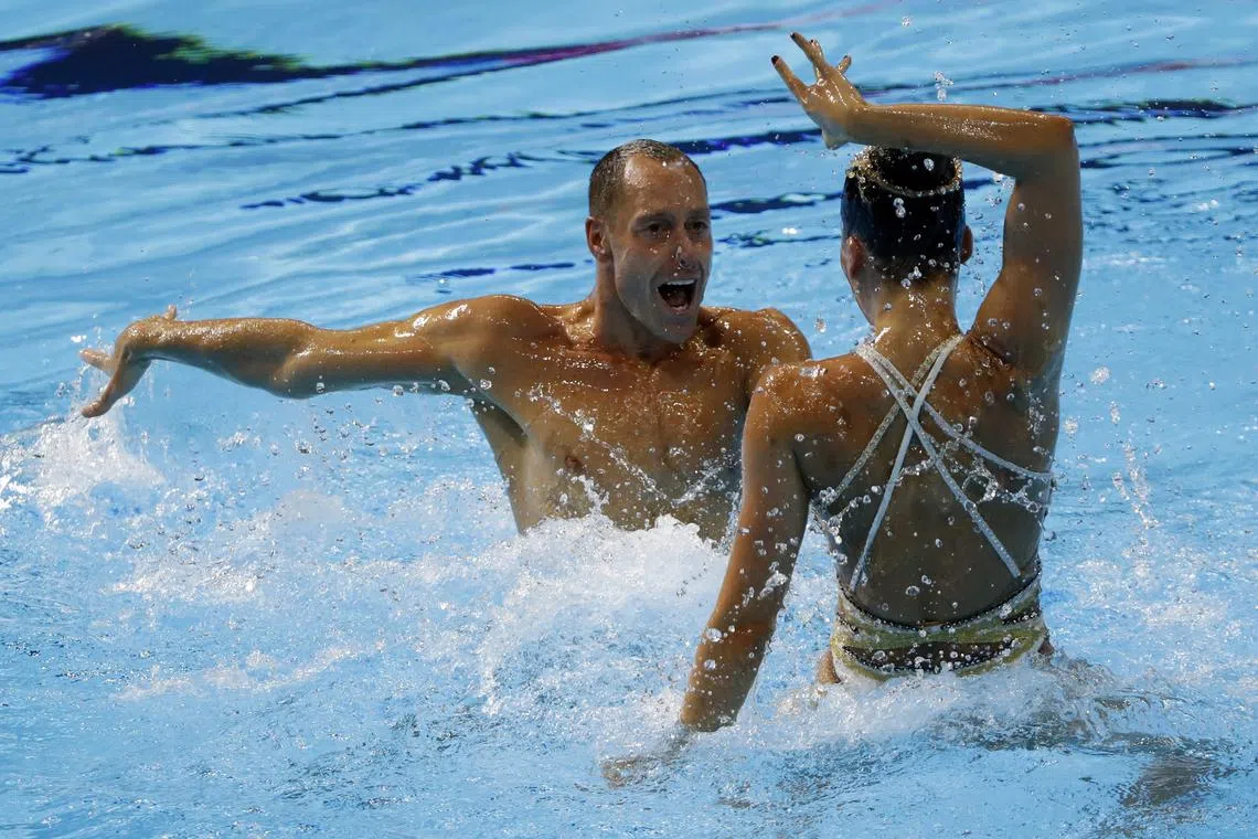 Swimming - 18th FINA World Swimming Championships - Mixed Duet Free Preliminary - Yeomju Gymnasium, Gwangju, South Korea - July 19, 2019. Bill May and Natalia Vega Figueroa of the U.S compete. REUTERS/Evgenia Novozhenina/File Photo
