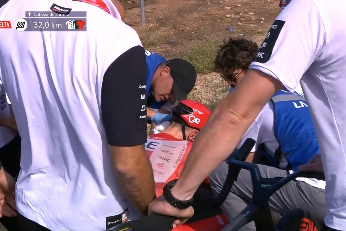 A heavy fall during the flat eighth stage of the Vuelta a Espana left Team UAE’s Tadej Pogacar with shoulder and face injuries.
