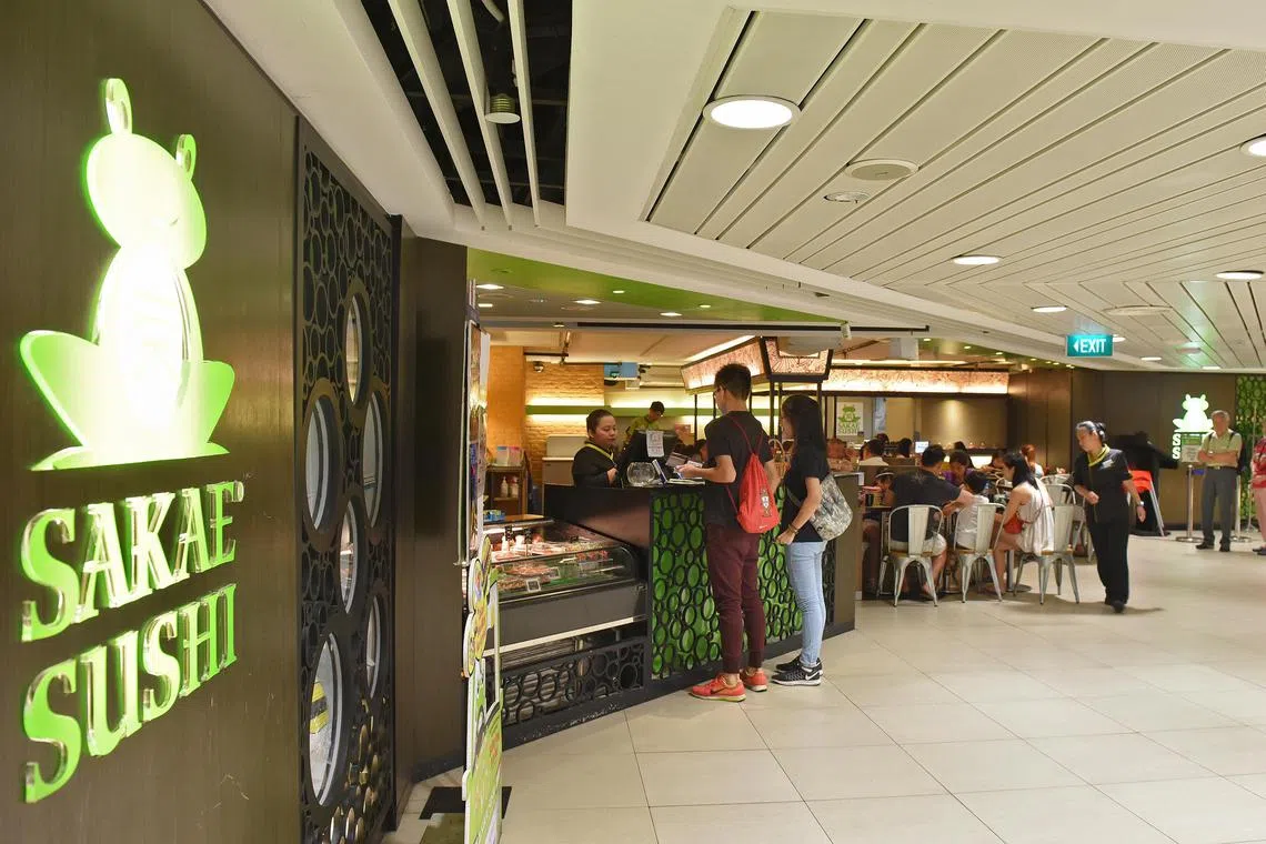 The storefront of a Sakae Sushi outlet in Junction 8 shopping mall.