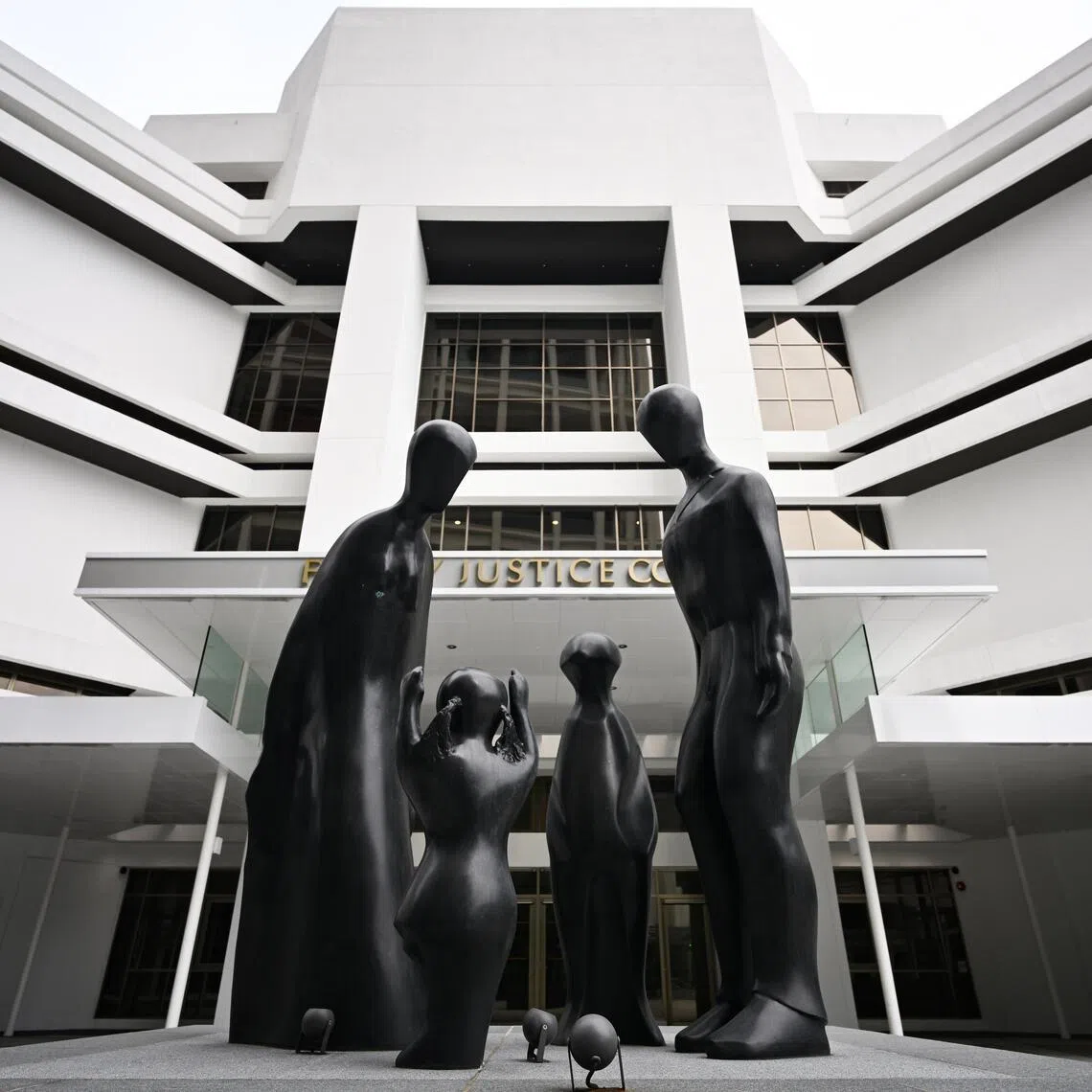 A sculpture titled, Family by Brother Joseph McNally outside the Family Justice Courts, which is the State Courts' old building in Havelock Square on March 4, 2026.