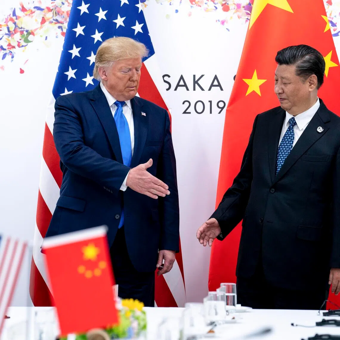 US President Donald Trump and Chinese President Xi Jinping at the Osaka G-20 summit in 2019 during Mr Trump’s first term in office. 