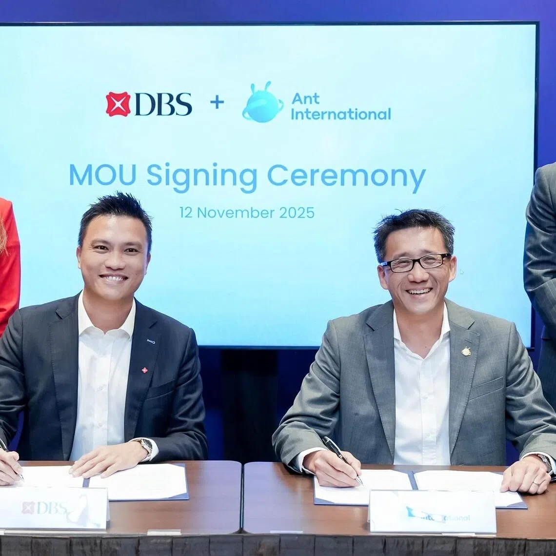 (From left to right) Ms Tan Su Shan, CEO of DBS; Mr Loy Hwee Chuan, segment head of telecommunications, media & tech, DBS; Mr Edward Yue, Alipay+ general manager, Ant International; and Mr Yang Peng, CEO of Ant International.