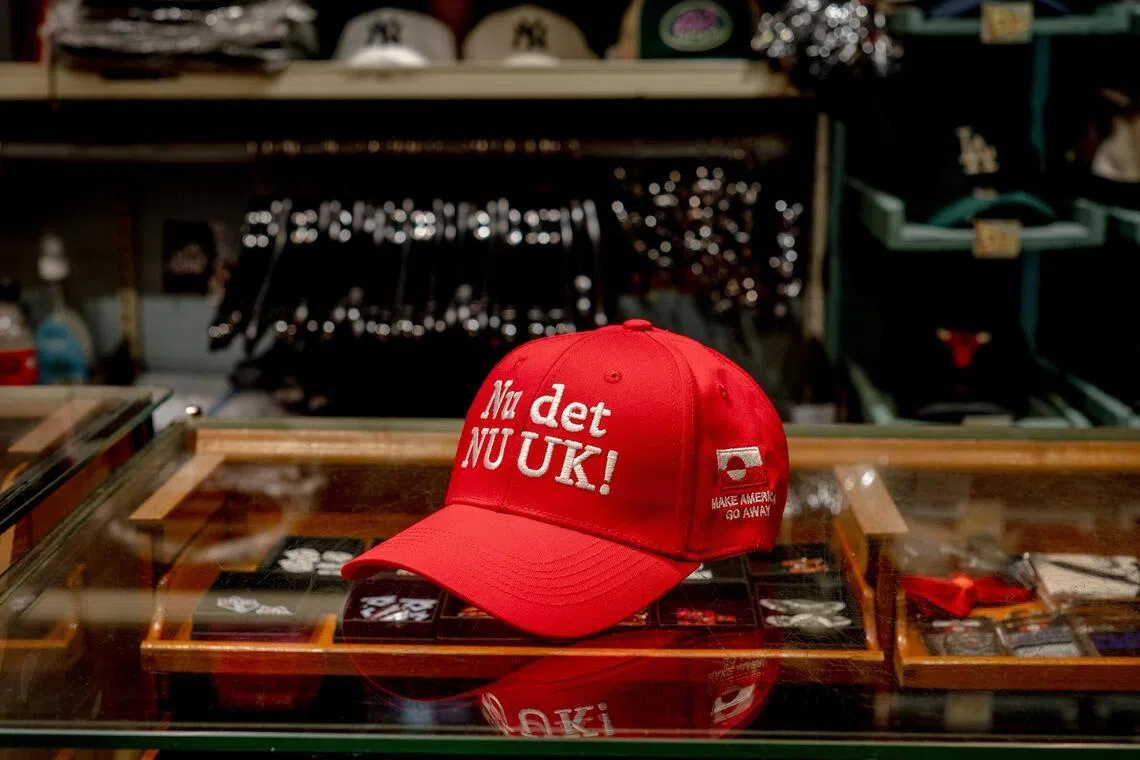A hat saying "Make America Go Away" and "Nu det Nuuk!" meaning "now is enough!" for sale at McKorman in Copenhagen, Denmark.