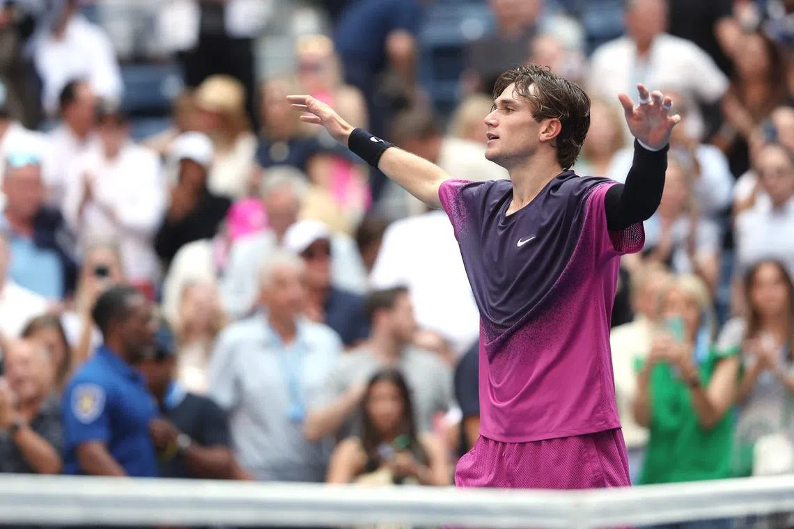 Britain's Jack Draper celebrates match point against Alex de Minaur of Australia.