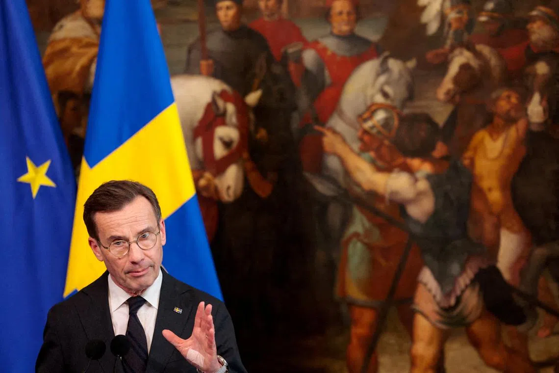 FILE PHOTO: Swedish Prime Minister Ulf Kristersson speaks during a press conference with Italian Prime Minister Giorgia Meloni (not pictured), in Rome, Italy, February 26, 2025. REUTERS/Remo Casilli//File Photo