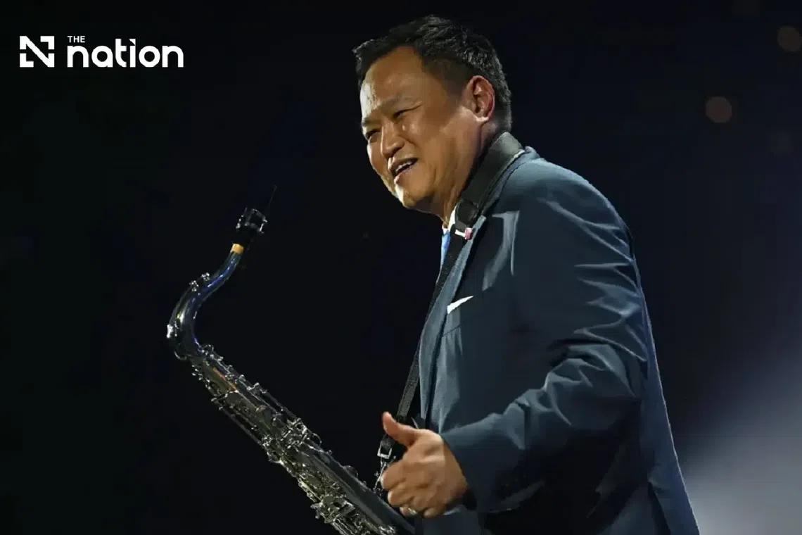 Thai PM Anutin Charnvirakul played the saxophone at a government reception attended by about 3,000 guests in Bangkok on Oct 16.
