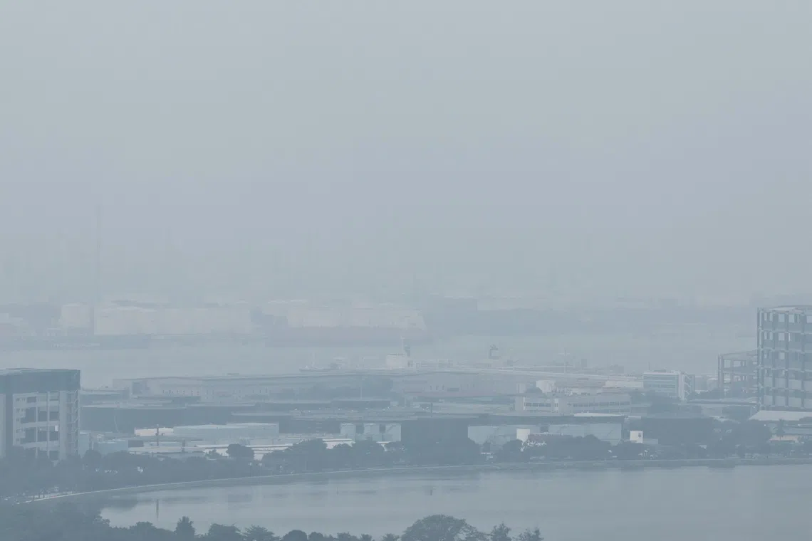 Hazy conditions seen from Clementi towards Jurong Island at about 7.20am on Oct 12.