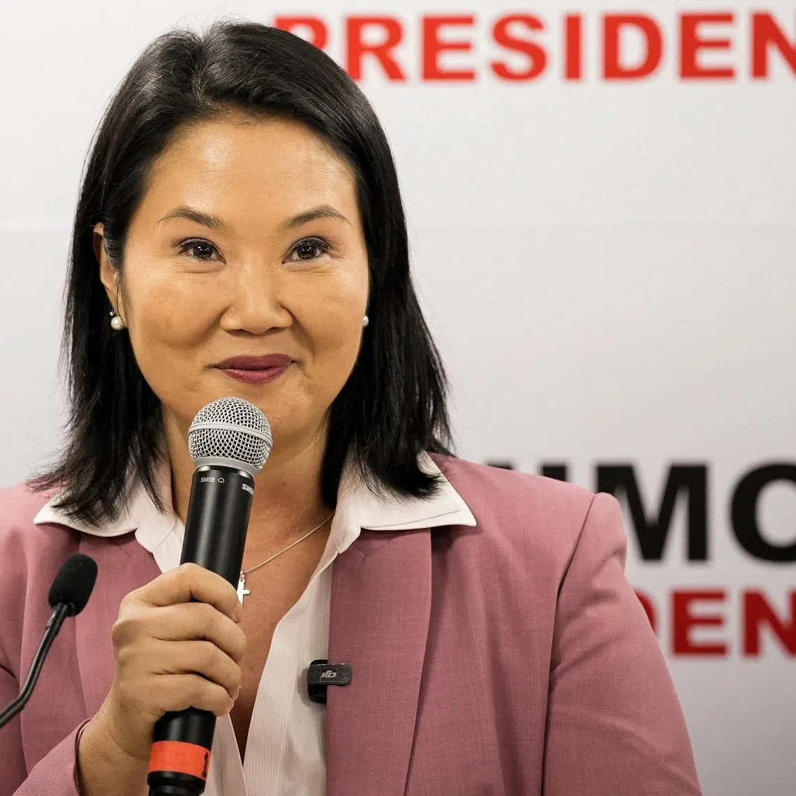 Peru's conservative Keiko Fujimori addresses the media at her party's Popular Force headquarters, after she narrowly defeated leftist congressman Roberto Sanchez in the Peruvian presidential election, ahead of the official result announcement, in Lima, Peru, June 24, 2026. REUTERS/Angela Ponce