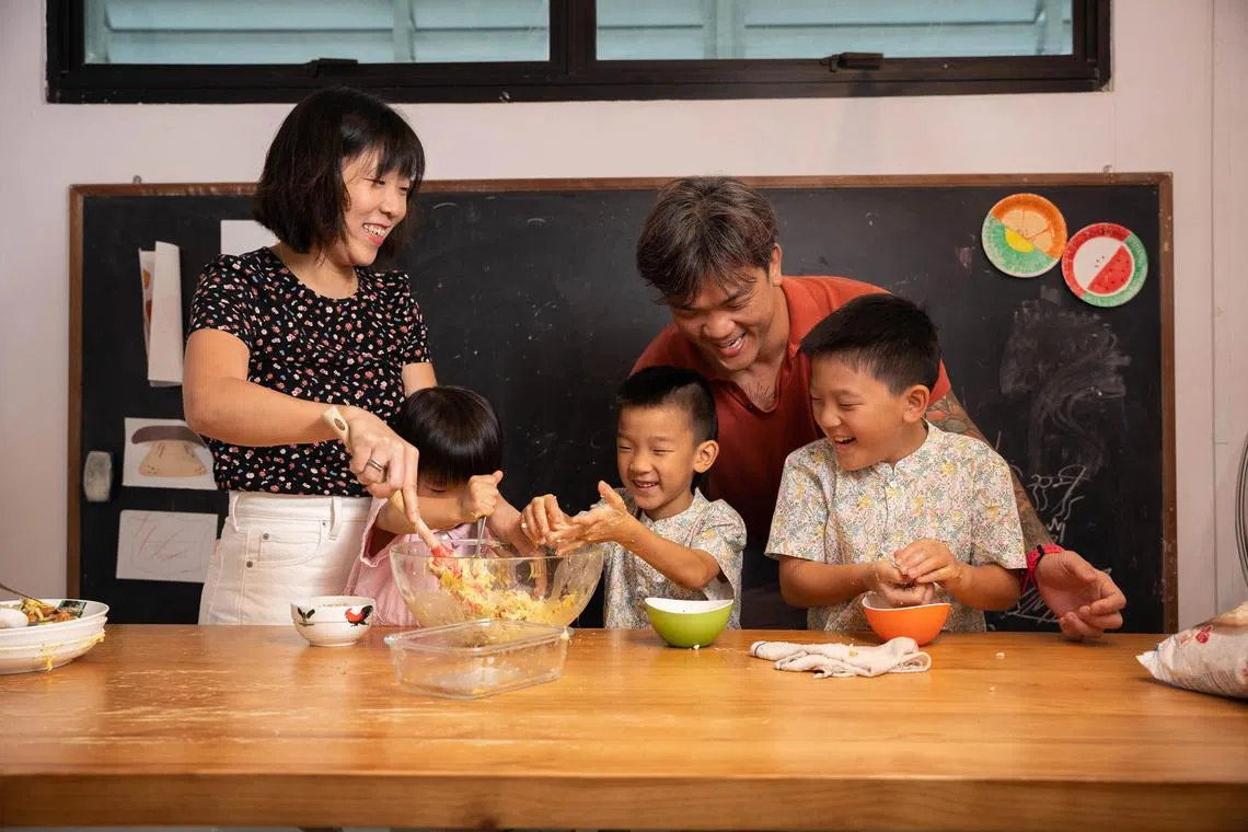 sysnack - ST20230614_202300027025. Brian Teo. Profile of Chen Shiqin (37 years old) and Irvin Tan (41 years old), Founders of HaruPlate, together with their children: Meryl Tan (3 years old), Lucius Tan (6 years old), and Oliver Tan (8 years old) with the finished durian granola product at the HaruPlate office at Toa Payoh on 14 June 2023.