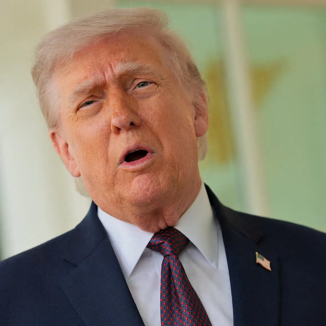 U.S. President Donald Trump speaks with the media at the White House in Washington, D.C., U.S., April 13, 2026. REUTERS/Jonathan Ernst