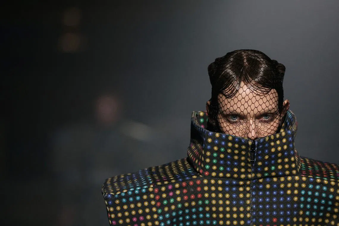 A model presenting a creation by Anrealage for the Womenswear Ready-to-wear Fall-Winter 2025/2026 collection as part of the Paris Fashion Week, at the American Cathedral in Paris, France on March 4, 2025. 