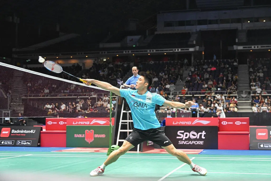 Singapore's Loh Kean Yew in action against 
Hong Kong's Lee Cheuk Yiu on 7 June 2023. 
First round of the Singapore Badminton Open