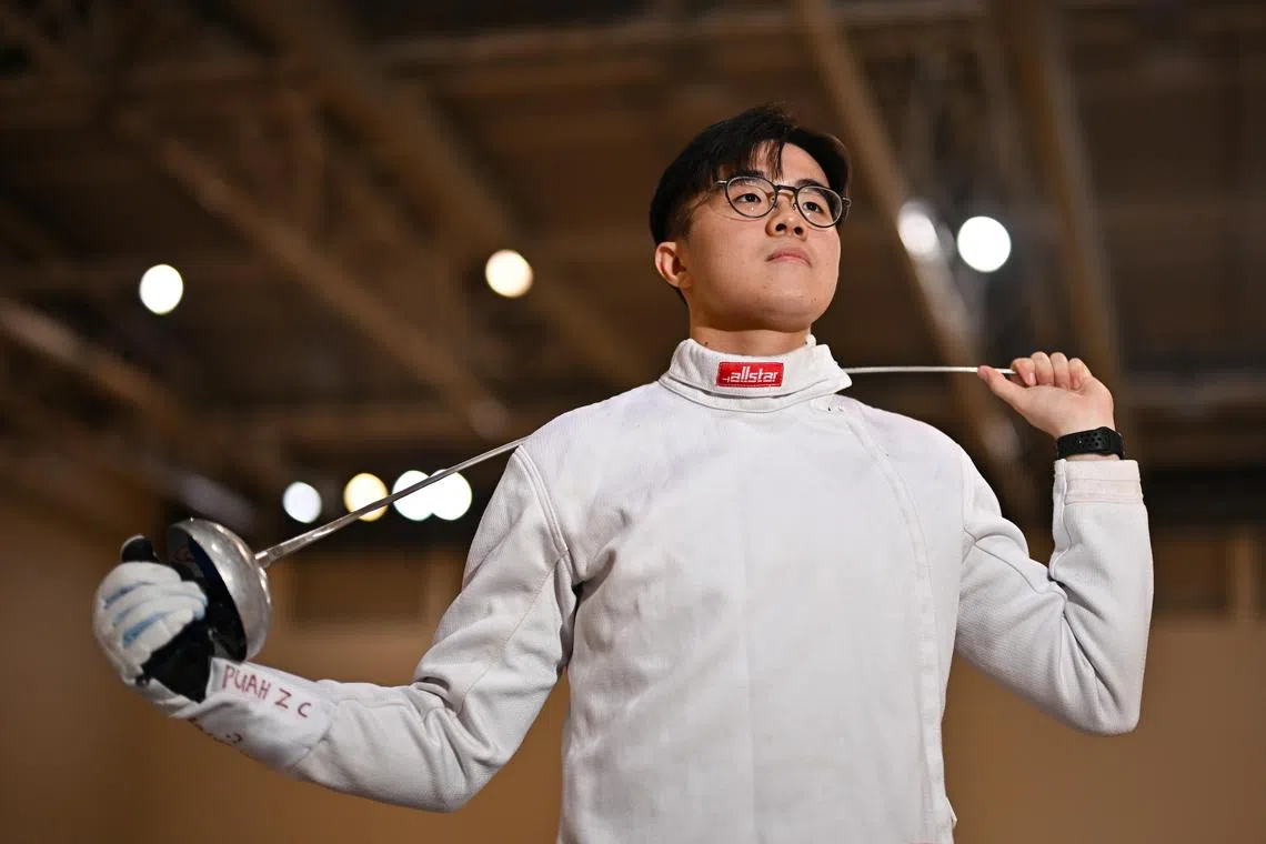 ST20240513-202483429577-Lim Yaohui-Melvyn Teoh-mtfence13/
Mr Puah Zee Cher, 23, Undergraduate at SIM and National Fencer, at Singapore Sports Hub on May 13, 2024.
Puah Zee Cher is the Fencing Singapore National champion, he works two jobs to support his fencing and will be for France on Tuesday to take part in a World Cup completely self funded.
(ST PHOTO: LIM YAOHUI)