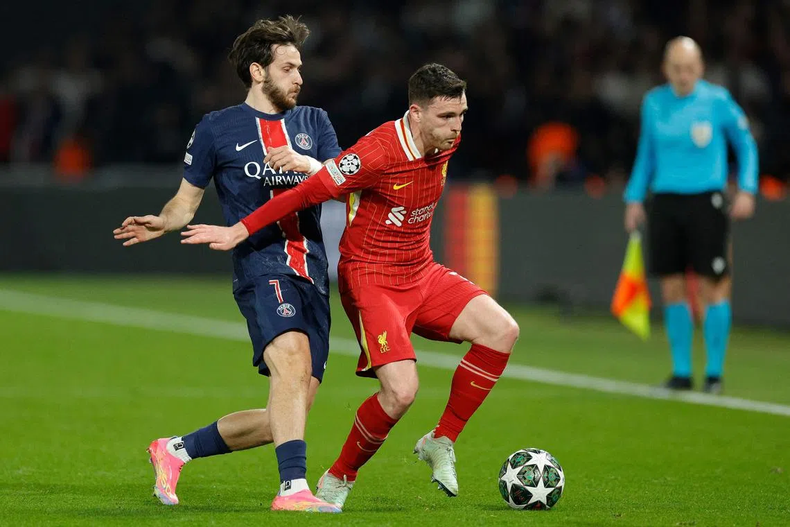 Liverpool's Scottish defender Andrew Robertson (right) and Paris Saint-Germain's Georgian forward Khvicha Kvaratskhelia vying for the ball during a Champions League last-16, first-leg clash at the Parc des Princes on March 5. The Reds won 1-0.