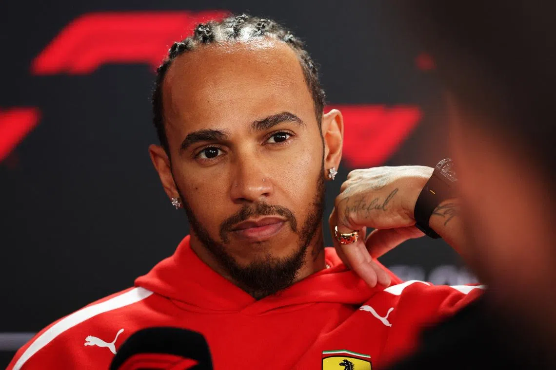 Formula One F1 - Japanese Grand Prix - Suzuka Circuit, Suzuka, Japan - March 26, 2026 Ferrari's Lewis Hamilton speaks to the media ahead of the Japanese Grand Prix REUTERS/Issei Kato
