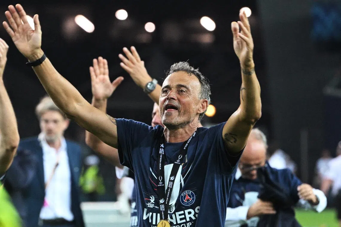 Soccer Football - UEFA Super Cup - Final - Paris St Germain v Tottenham Hotspur - Bluenergy Stadium, Udine, Italy - August 13, 2025 Paris St Germain coach Luis Enrique celebrates after winning the UEFA Super Cup REUTERS/Jennifer Lorenzini/File Photo