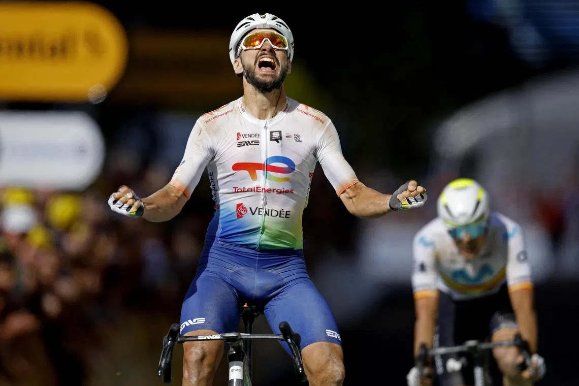 TotalEnergies rider Anthony Turgis celebrating after winning Stage 9 of the Tour de France on July 7.