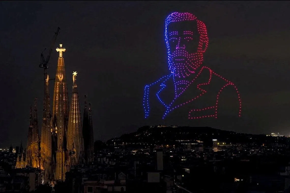 Drones forming the likeness of Catalan architect Antoni Gaudi during the blessing and inauguration of the Tower of Jesus Christ at the Basilica of the Sagrada Familia during Pope Leo XIV's apostolic journey in Barcelona, Spain, June 10.
