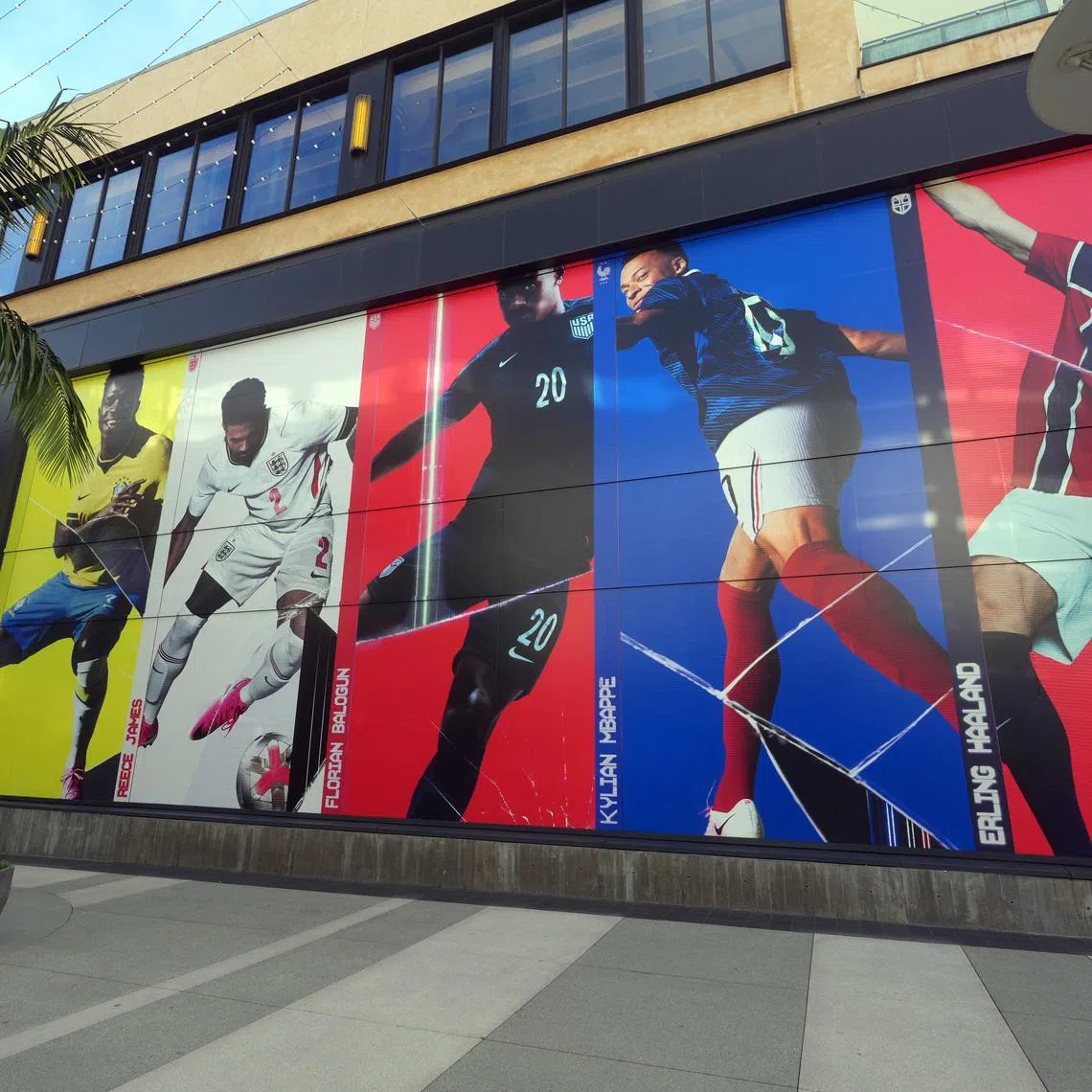 Jun 10, 2026; Santa Monica, California, USA; A Nike soccer display featuring at Brazil forward Vini Jr. (7), England right back Reece James (20), USMNT forward Folarin Balogun (20) and France forward Kylian Mbape (10) at Nike Santa Monica. Mandatory Credit: Kirby Lee-Imagn Images