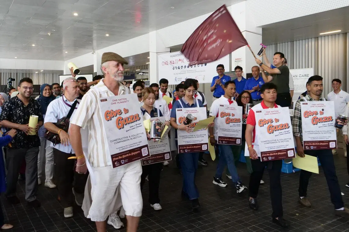 Senior Minister of State for Defence and Manpower Zaqy Mohamad flagging off the Street Collection for Gaza Relief initiative on Nov 17.