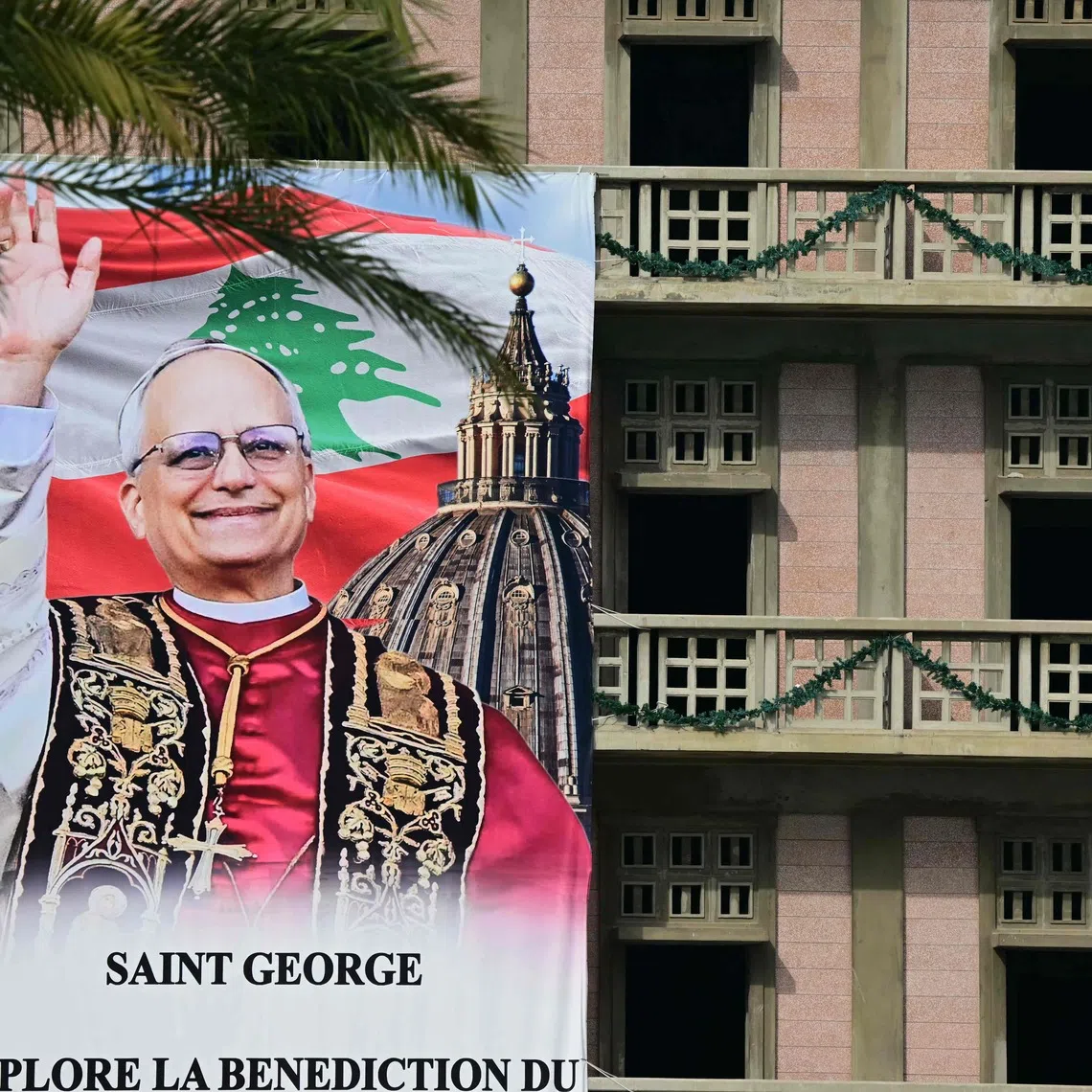 A banner depicting Pope Leo XIV hanging from a building in Beirut on Nov 29, ahead of his visit to Lebanon.