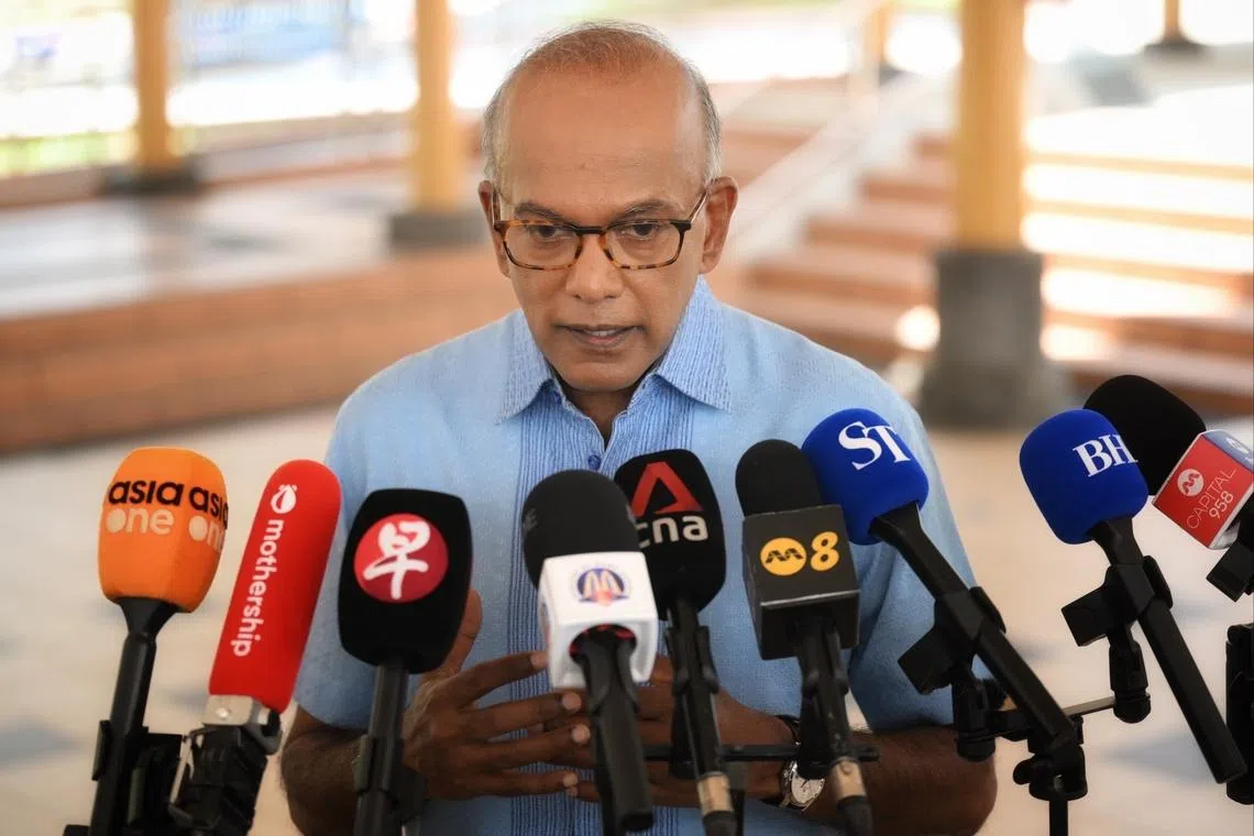 Coordinating Minister for National Security and Minister for Home Affairs K. Shanmugam speaking to the media on the sidelines of a community event in Yishun on April 4.