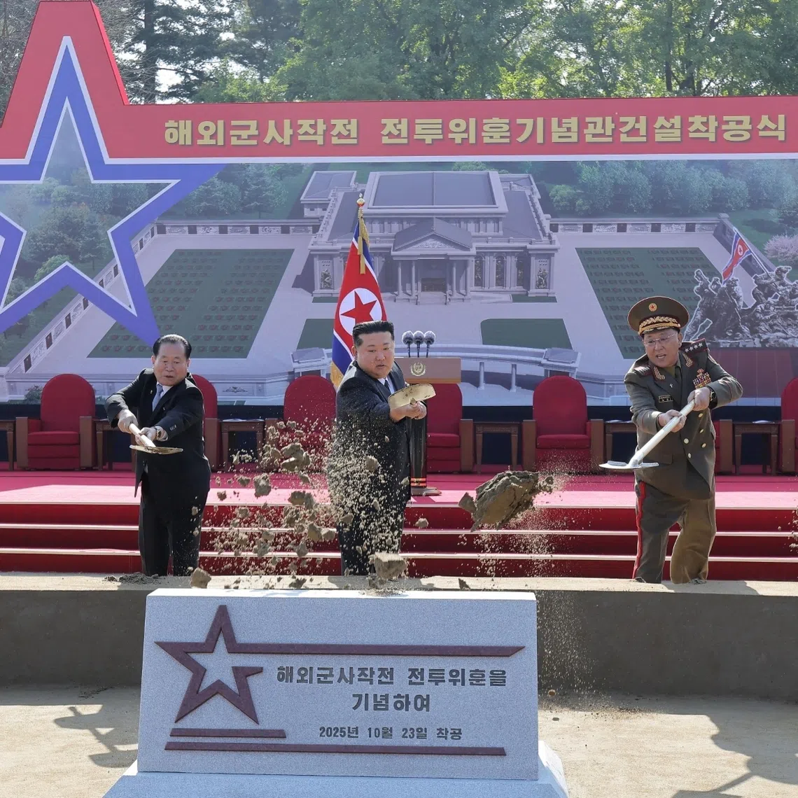 Kim Jong Un and Russian Ambassador Alexander Matsegora (second from left) at a groundbreaking ceremony for a memorial hall in Pyongyang.