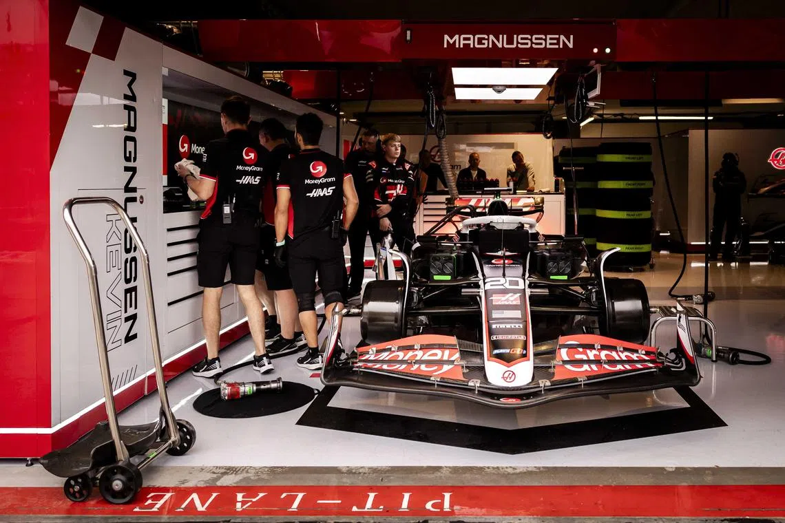 Mechanics at Haas' team garage during third practice on Aug 24, 2024 for the Formula One Dutch Grand Prix in Zandvoort, Netherlands.
