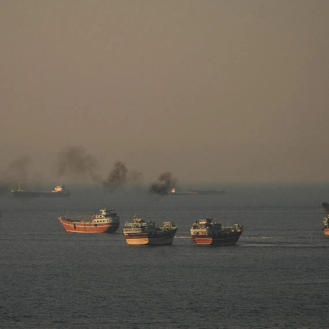 Vessels at the Strait of Hormuz, as seen from Musandam, Oman, on June 15. 