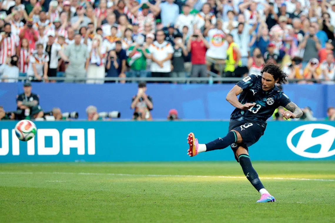Soccer Football - FIFA World Cup 2026 - Round of 32 - Germany v Paraguay - Boston Stadium, Foxborough, Massachusetts, U.S. - June 29, 2026 Paraguay's Jose Canale scores a penalty during the penalty shootout to win the match and qualify for the round of 16 stage of the world cup REUTERS/Brian Snyder