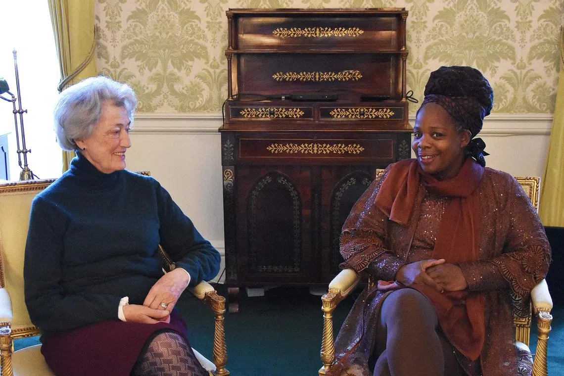 Lady Susan Hussey (left) meeting Ngozi Fulani, founder of the charity Sistah Space, in the Regency room at Buckingham Palace in London, on Dec 16, 2022.