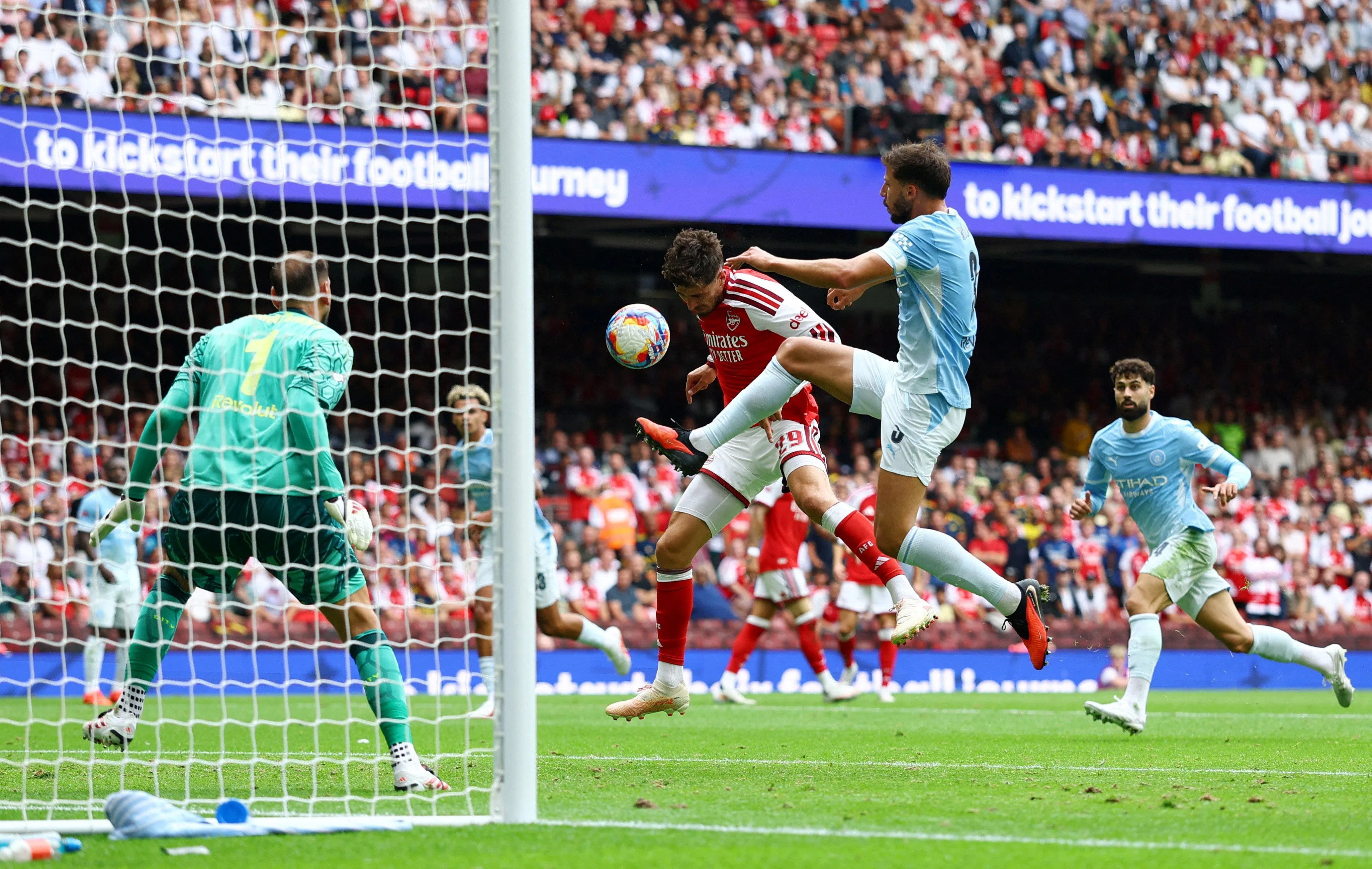 Kai Havertz scores Arsenal’s second goal past Manchester City’s Gianluigi Donnarumma.
