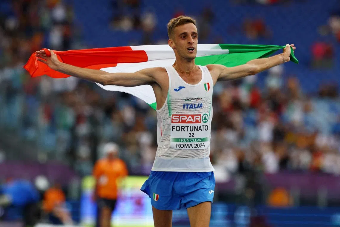 FILE PHOTO: Athletics - European Athletics Championships - Stadio Olimpico, Rome, Italy - June 8, 2024 Italy's Francesco Fortunato celebrates finishing third in the men's 20km race walk final. REUTERS/Manon Cruz/File Photo