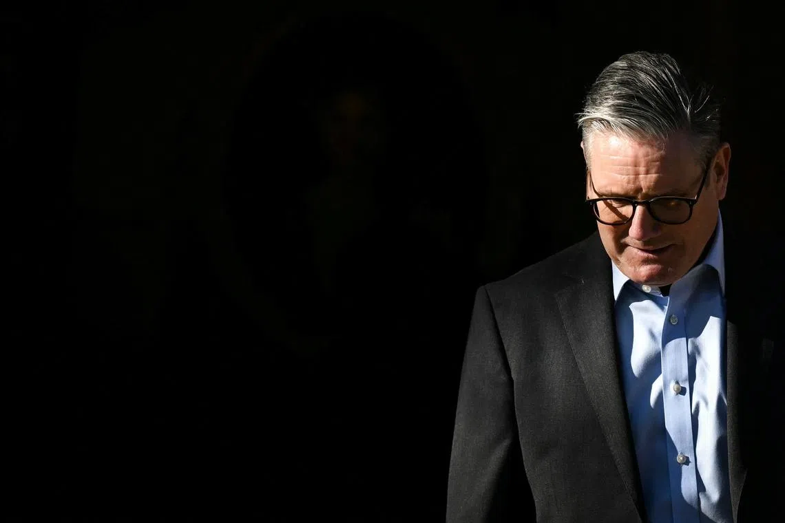 Britain's Prime Minister Keir Starmer waits for the arrival of Germany's Chancellor Olaf Scholz at the Chequers, in Aylesbury, Britain, on February 2, 2025.     BEN STANSALL/Pool via REUTERS